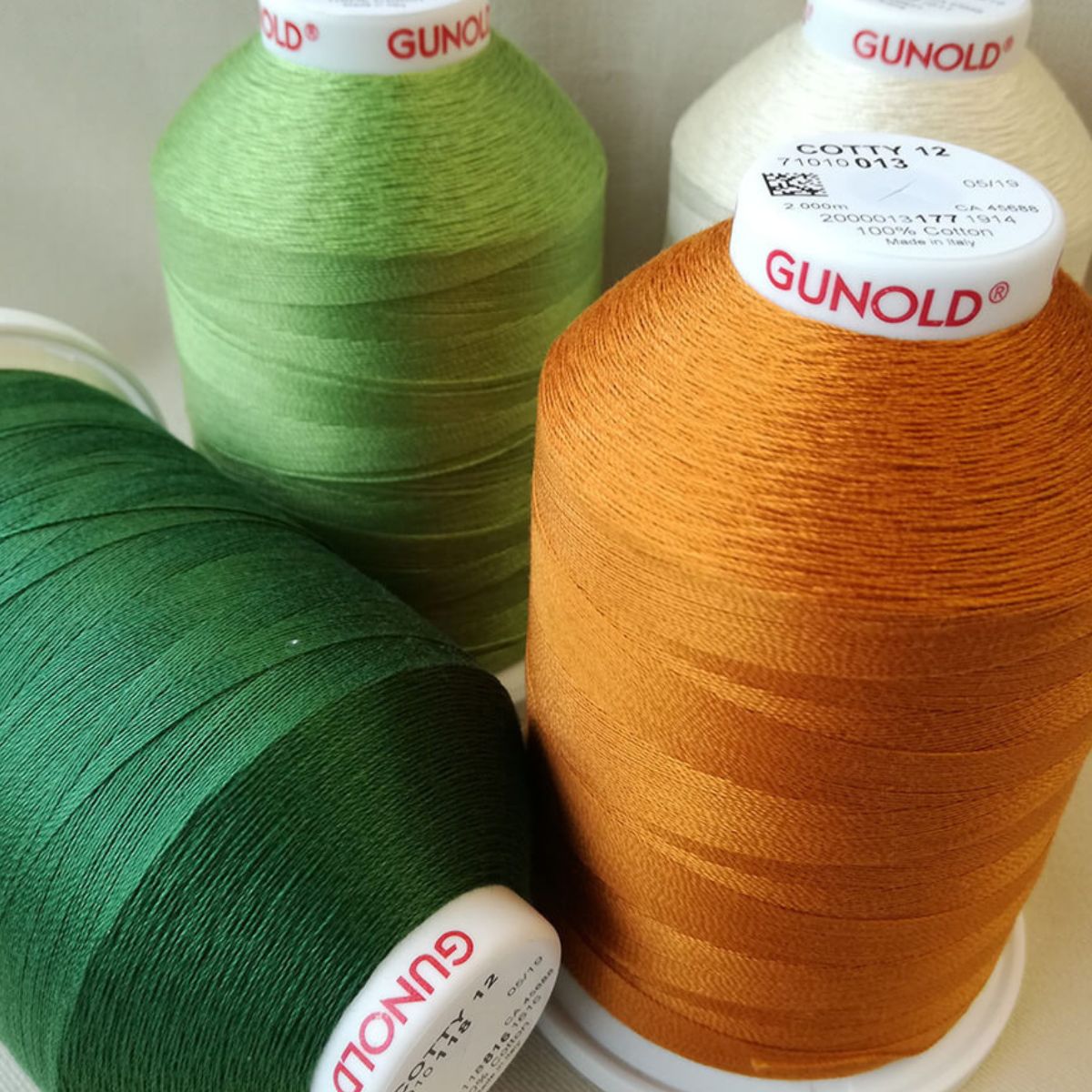 green, white, orange threads